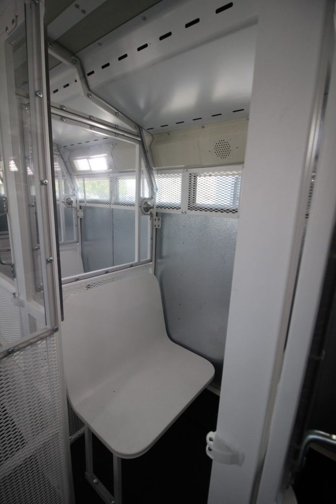 custom prisoner transport bus interior